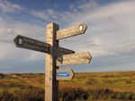 Signpost at the northern end of the Peddars Way where it meets the Norfolk Coast Path