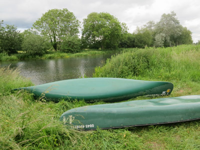Canoes by the River Bure in Buxton